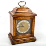 An early/mid-20th century Mappin & Webb burr-walnut bracket clock, brass dial with Roman numeral