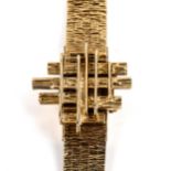BUECHE GIROD - a lady's Vintage 9ct gold mechanical bracelet watch, circa 1960s, concealed