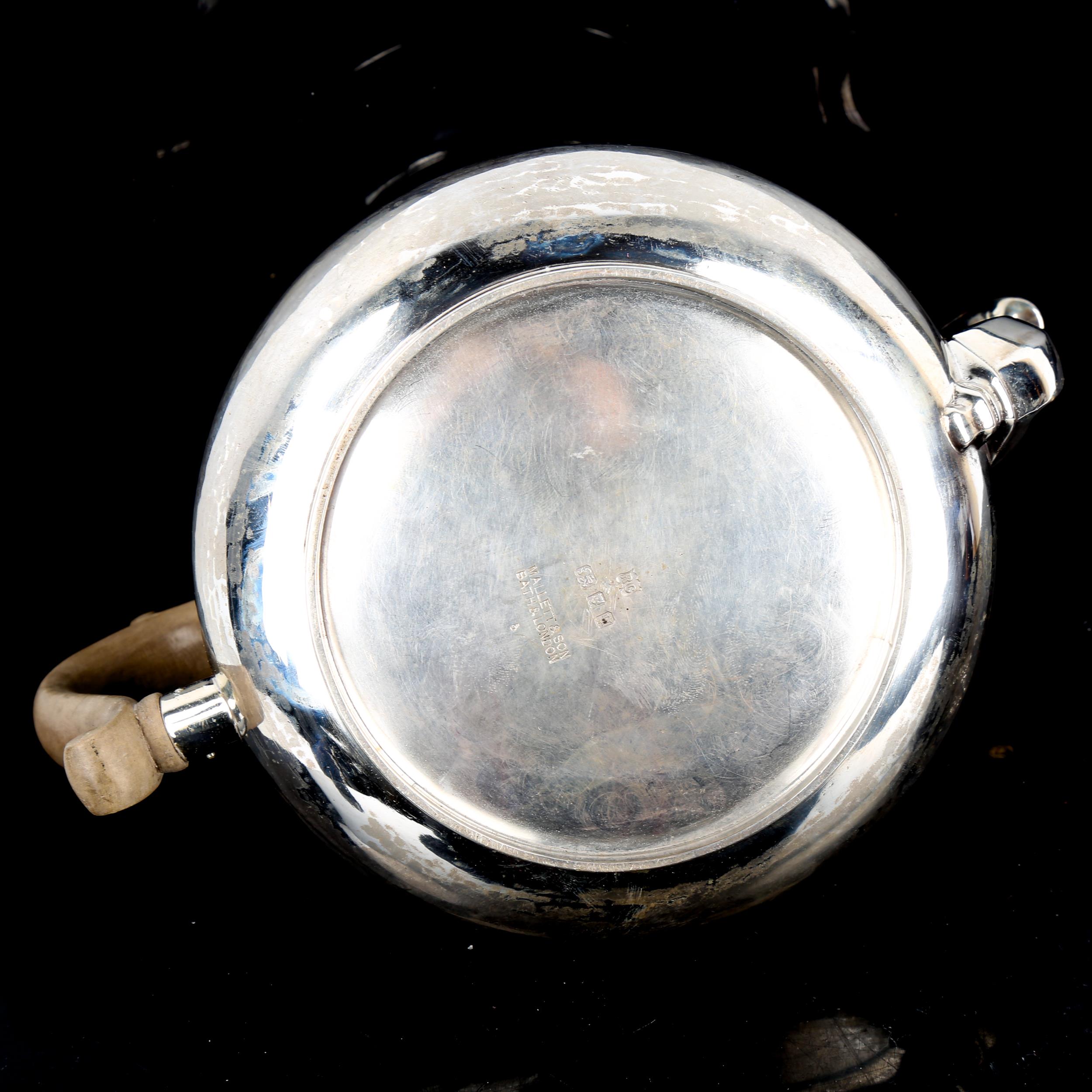 A George V silver squat teapot, in Queen Anne style, with scrolled spout, planished finish and - Image 3 of 4