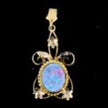 A Vintage 9ct gold black opal doublet pendant, openwork floral settings with rope twist surround,