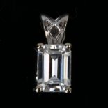 A modern 18ct white gold 1ct emerald-cut synthetic moissanite pendant, by Forever One Inc.,