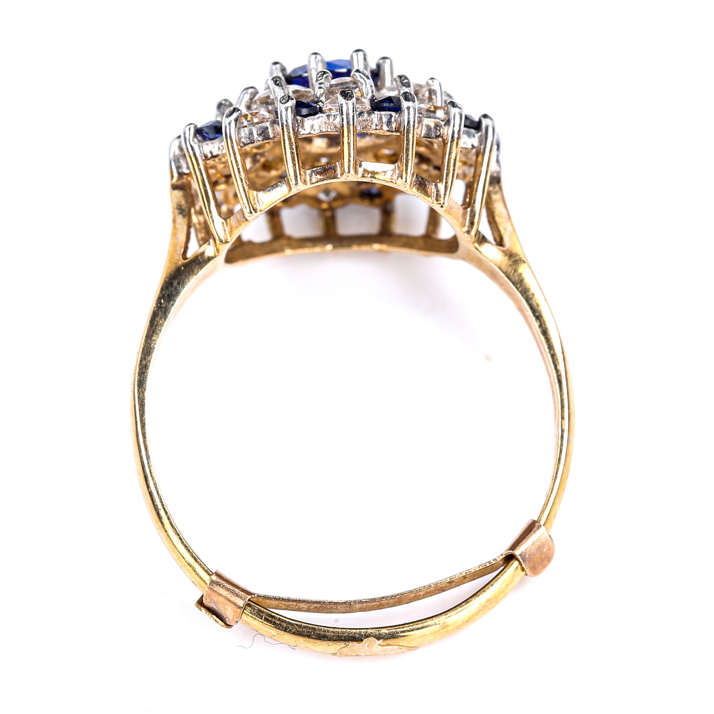 A late 20th century 9ct gold blue and white sapphire snowflake cluster ring, set with round cut - Image 3 of 4