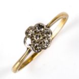 An unmarked gold diamond cluster flowerhead ring, set with old and modern brilliant-cut diamonds,