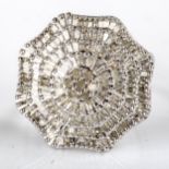 A large modern sterling silver diamond cluster ring, tiers set with single and baguette-cut