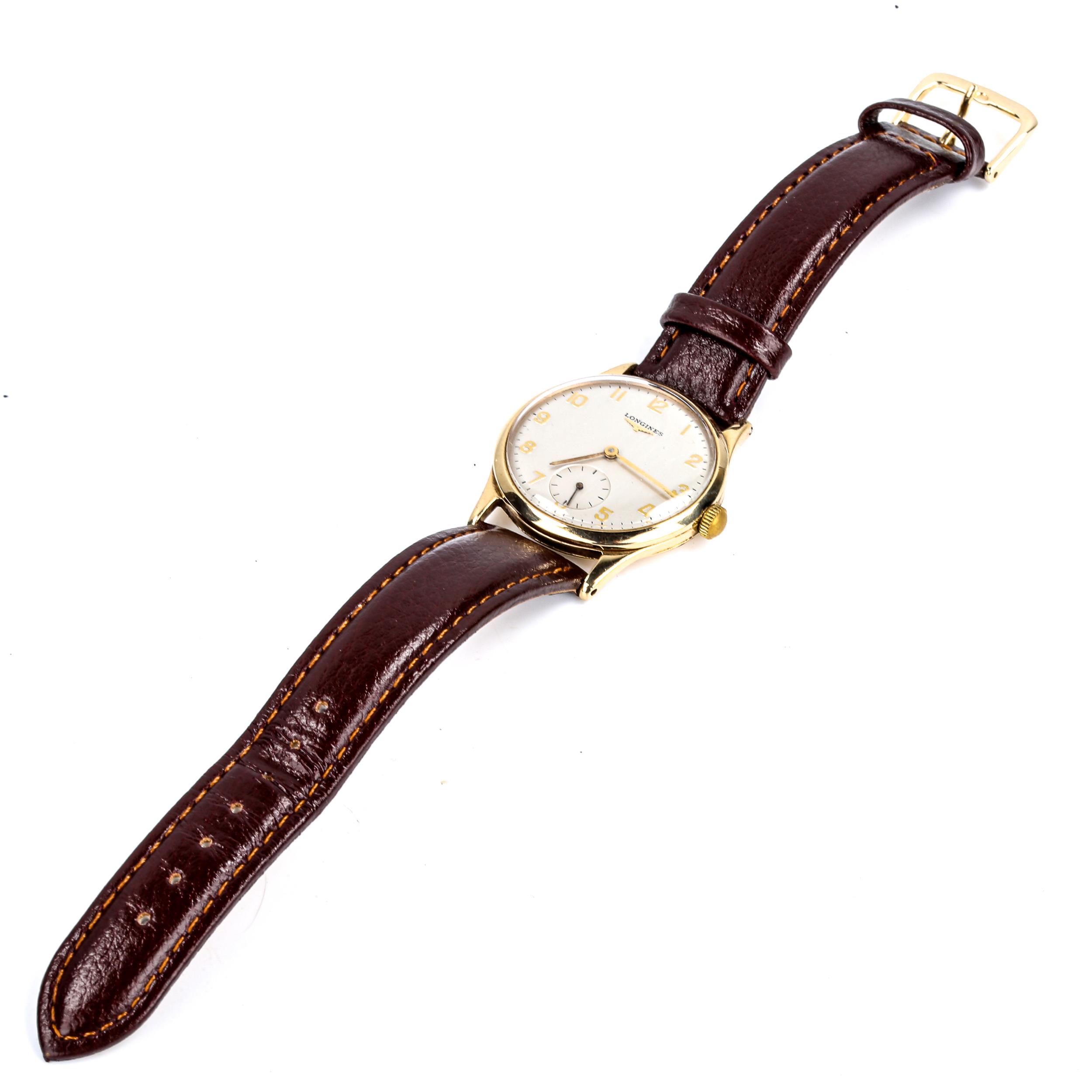 LONGINES - a Vintage 9ct gold mechanical wristwatch, ref. 13322, circa 1964, silvered dial with gilt - Image 2 of 5