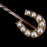 A Victorian pearl horseshoe stickpin, unmarked gold settings, overall length 69.3mm, 3.9g No