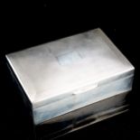 An Elizabeth II silver cigarette box, rectangular form with engine turned decoration, by Charles S