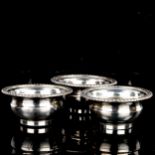 A set of 3 Old Sheffield plate salt cellars, with engraved squirrel crests and gadrooned rims with