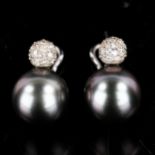 A pair of late 20th century 18ct white gold black South Sea pearl and diamond cluster earrings, by W