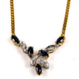 A late 20th century 18ct gold sapphire and diamond pendant necklace, set with marquise cut sapphires