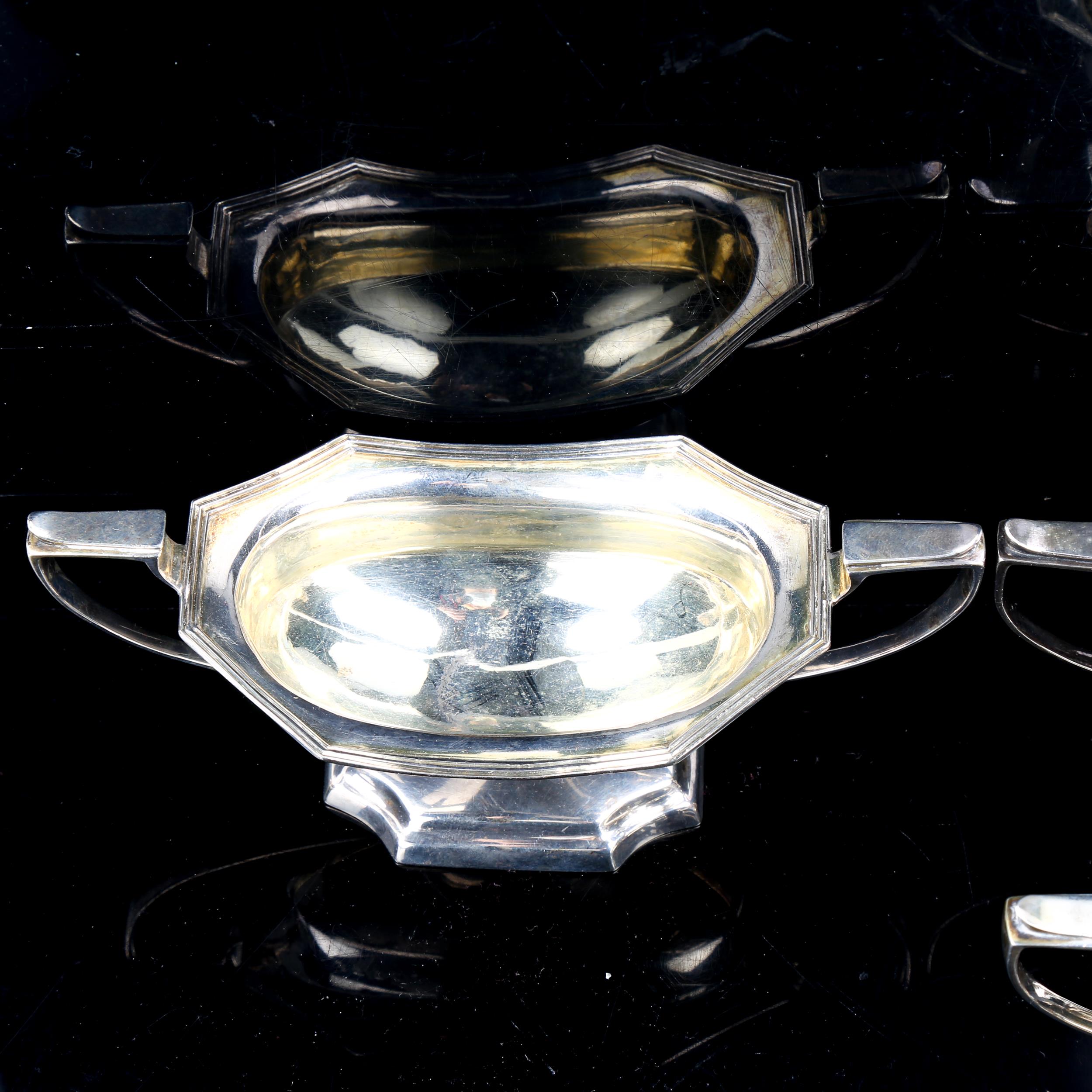 A set of 4 George III silver two-handled salt cellars, octagonal form with pedestal bases, reeded - Image 4 of 4