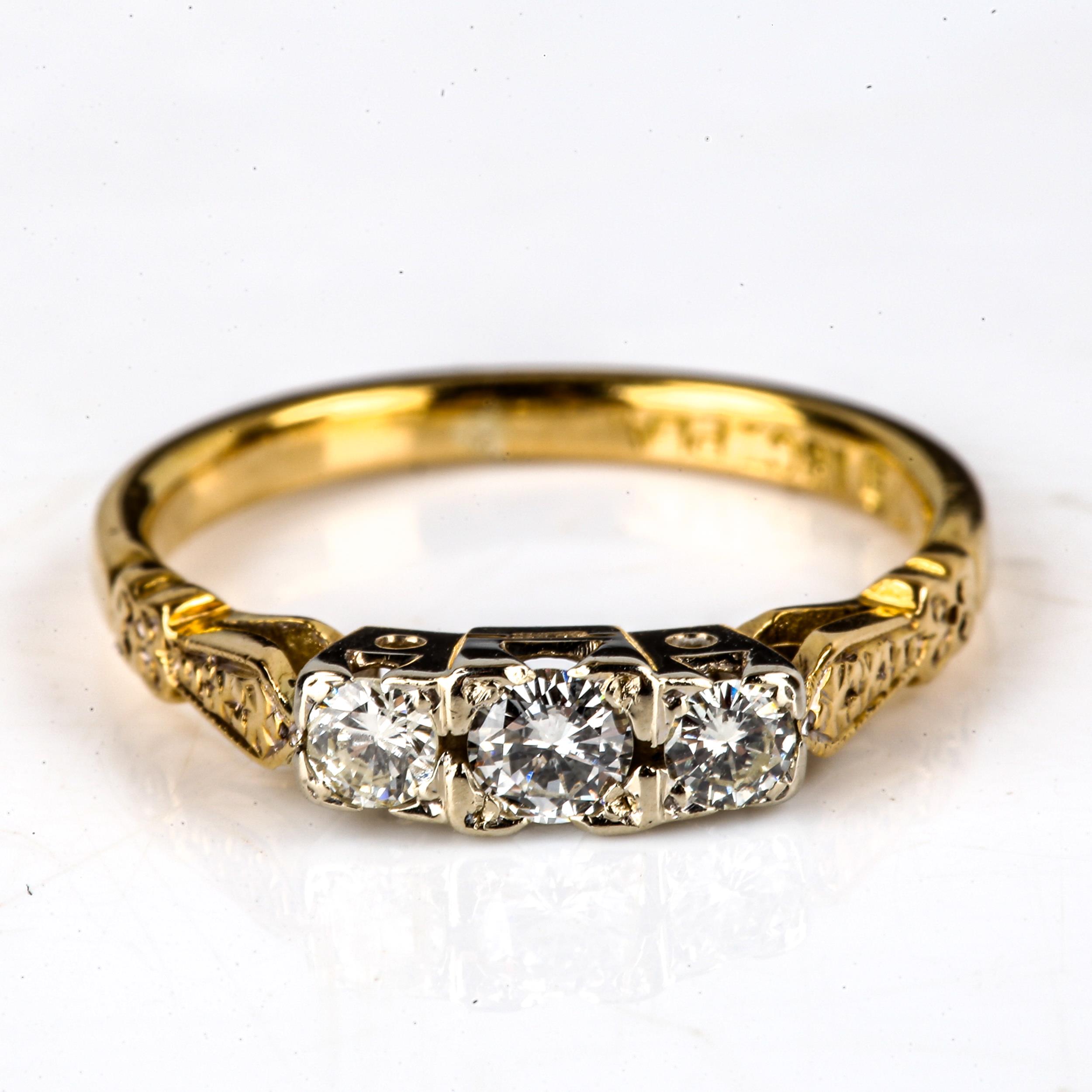 An 18ct gold 3-stone diamond ring, platinum-topped set with modern round brilliant-cut diamonds, - Image 2 of 4