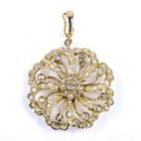 An 18ct gold diamond cluster flowerhead pendant, set with rose cut diamonds, total diamond content