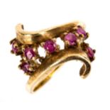 A late 20th century 9ct gold ruby crossover ring, hallmarks Birmingham 1975, setting height 19mm,