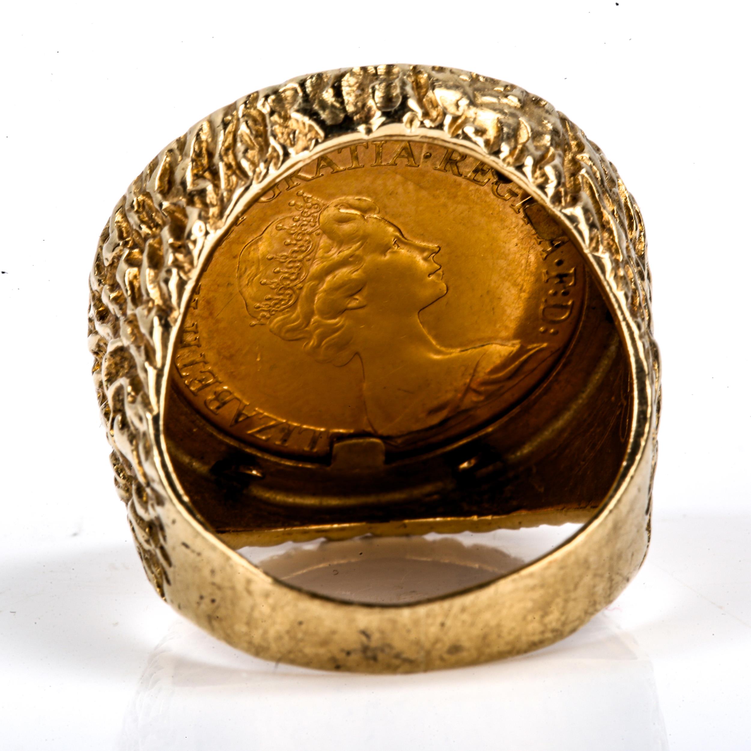 An Elizabeth II 1974 gold full sovereign coin, in heavy 9ct gold textured ring mount, setting height - Image 4 of 4