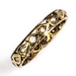 A mid-20th century 9ct gold paste eternity ring, band width 3.5mm, size M, 1.7g No damage or repair,