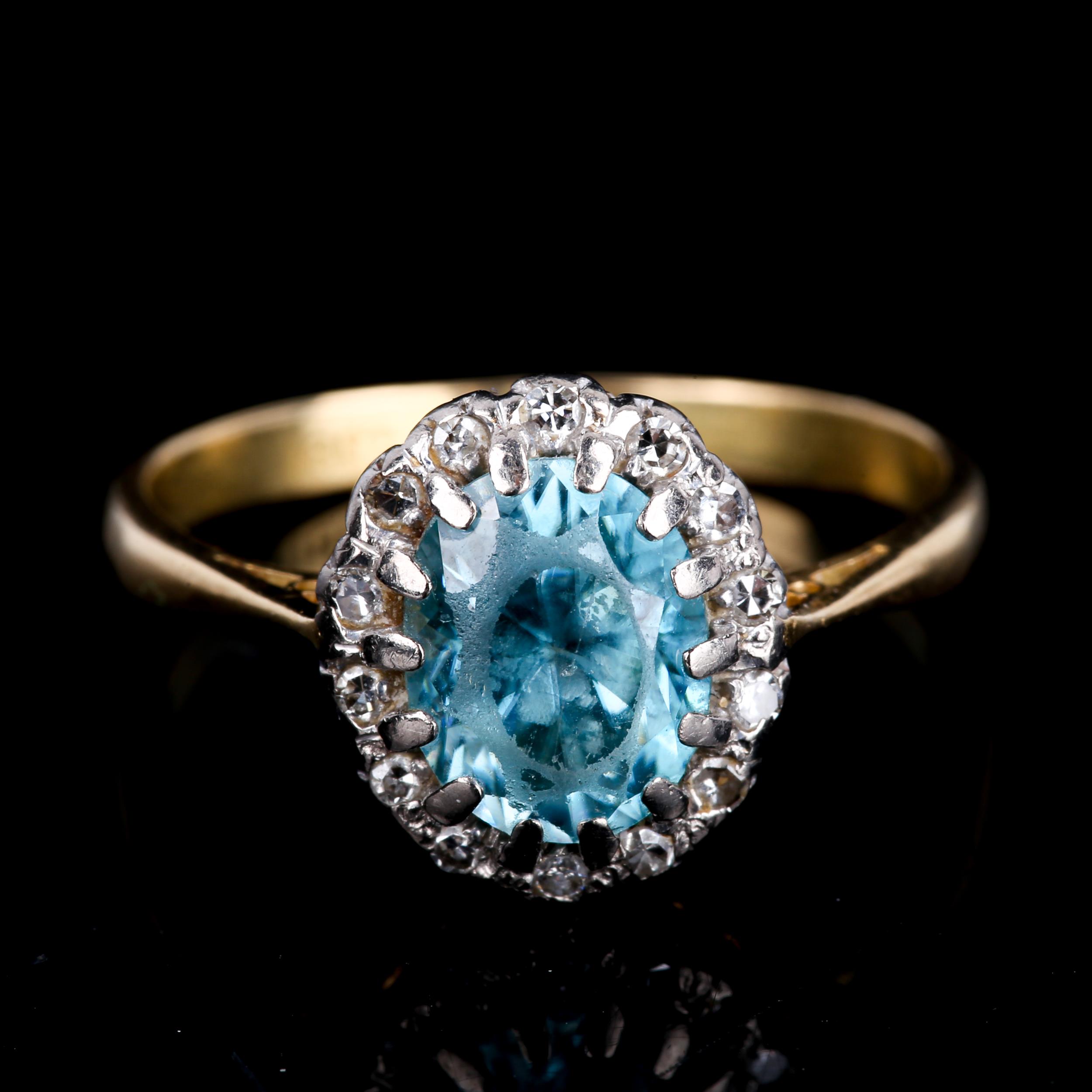 An 18ct gold blue zircon and diamond oval cluster ring, set with oval mixed-cut zircon and single- - Image 2 of 4