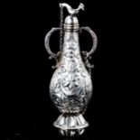 An 18th century Spanish Colonial unmarked silver perfume flask, relief embossed foliate decoration
