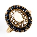 A late 20th century 9ct gold opal and sapphire oval cluster ring, set with oval cabochon opal and