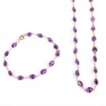 A modern 9ct rose gold matching line amethyst necklace and bracelet set, bezel set with oval mixed-