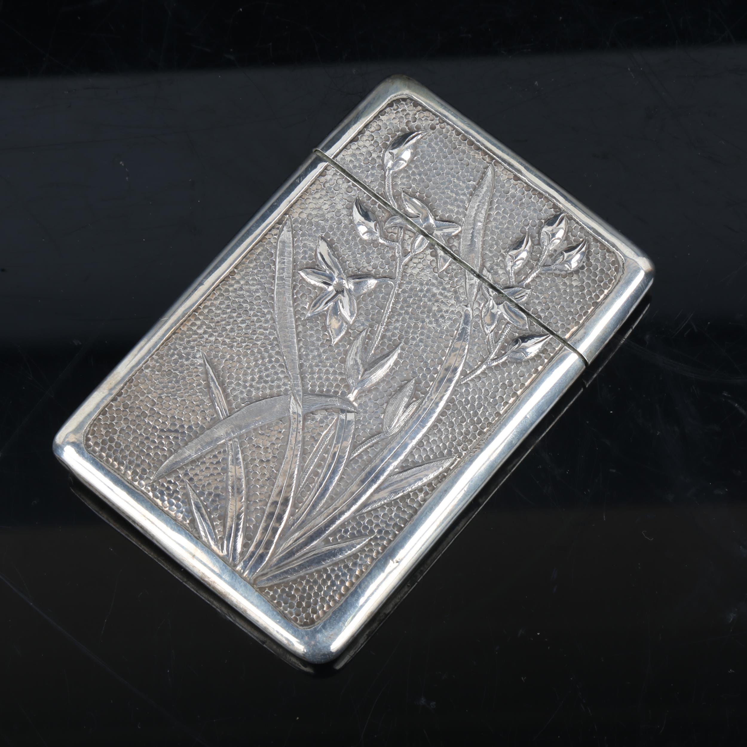 An early 20th century Chinese silver card case, relief embossed iris and chrysanthemum decoration - Image 2 of 4