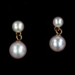 A pair of 9ct gold pearl drop earrings, largest pearl diameter 6.3mm, 1.3g No damage or repairs,