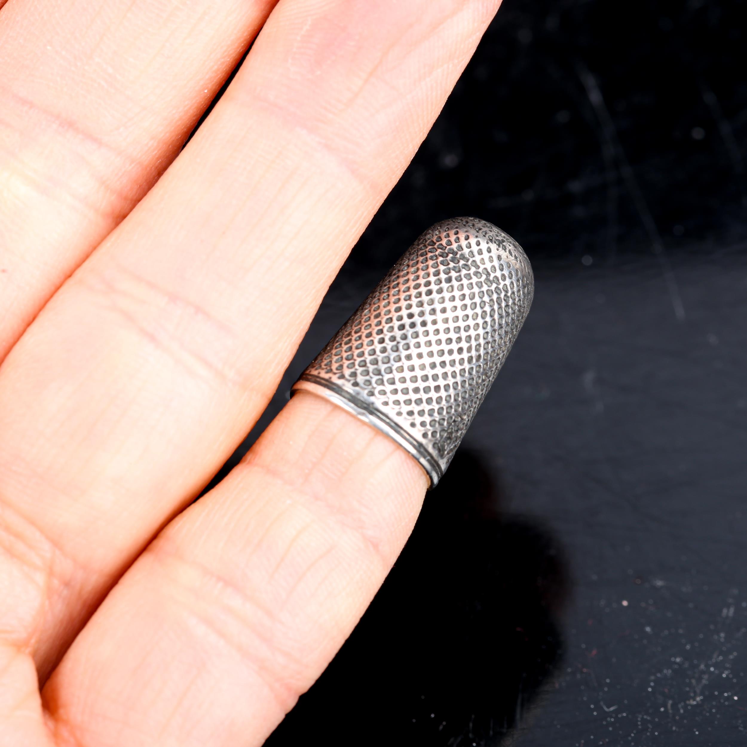 A small Georgian silver thimble, possibly by Thomas Newbold, height 2cm, opening diameter 11.4mm - Image 4 of 4