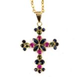 A modern 9ct gold gem set cross pendant necklace, on 9ct trace link chain, gemstones include peridot