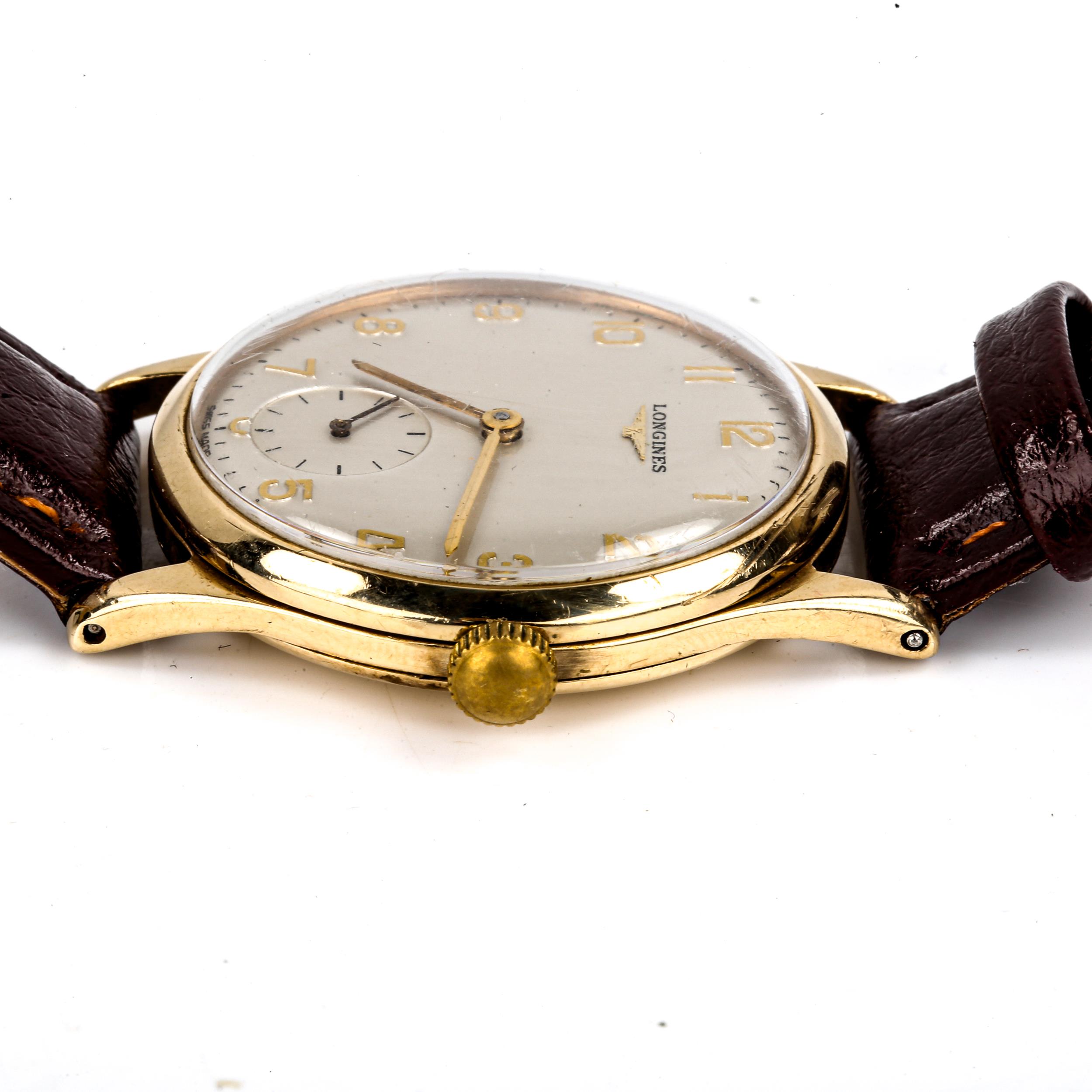 LONGINES - a Vintage 9ct gold mechanical wristwatch, ref. 13322, circa 1964, silvered dial with gilt - Image 4 of 5