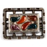 A Victorian Scottish unmarked silver and hardstone brooch, rectangular form with openwork settings