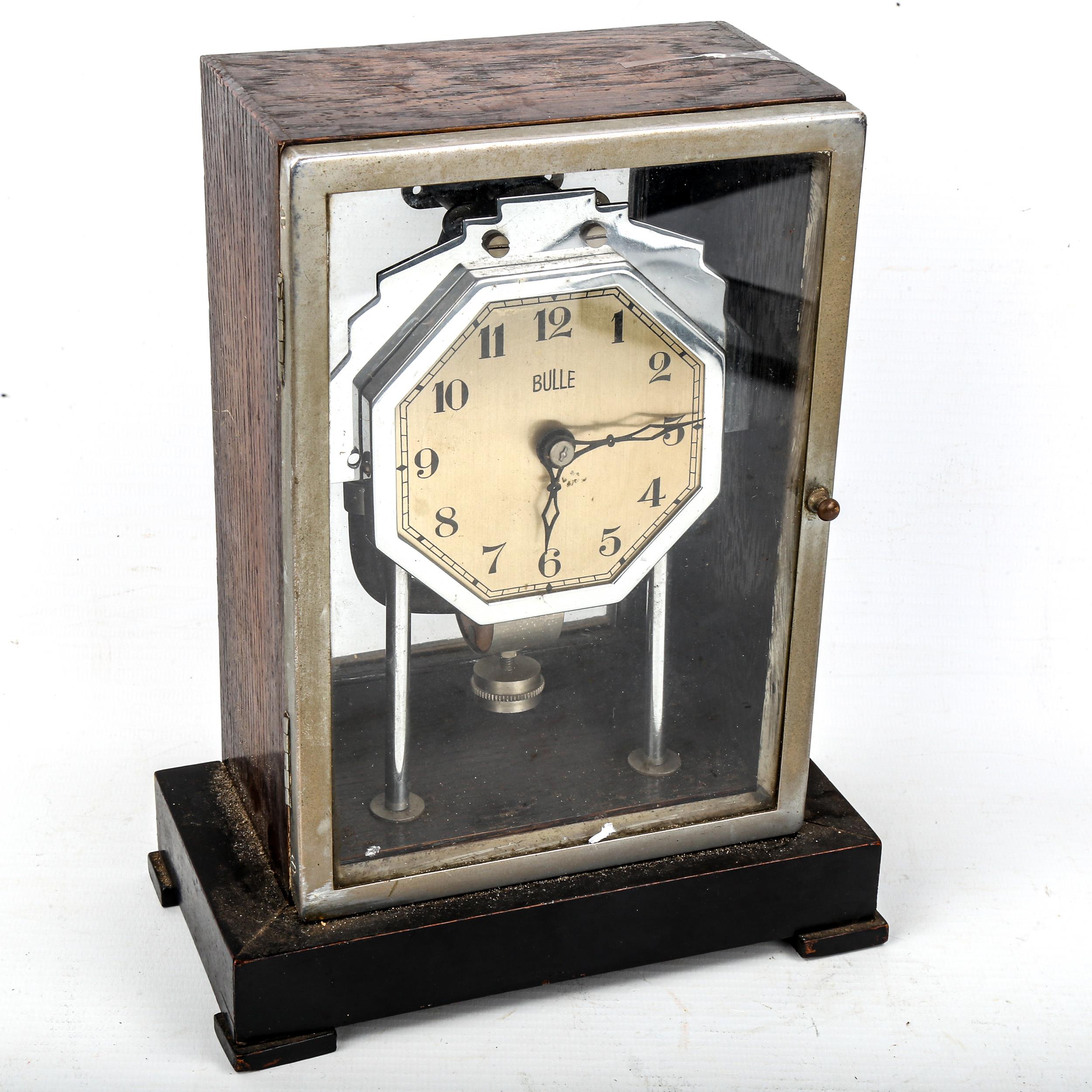 A Vintage Bulle electro-magnetic mantel clock, silver dial with Arabic numerals and stained oak