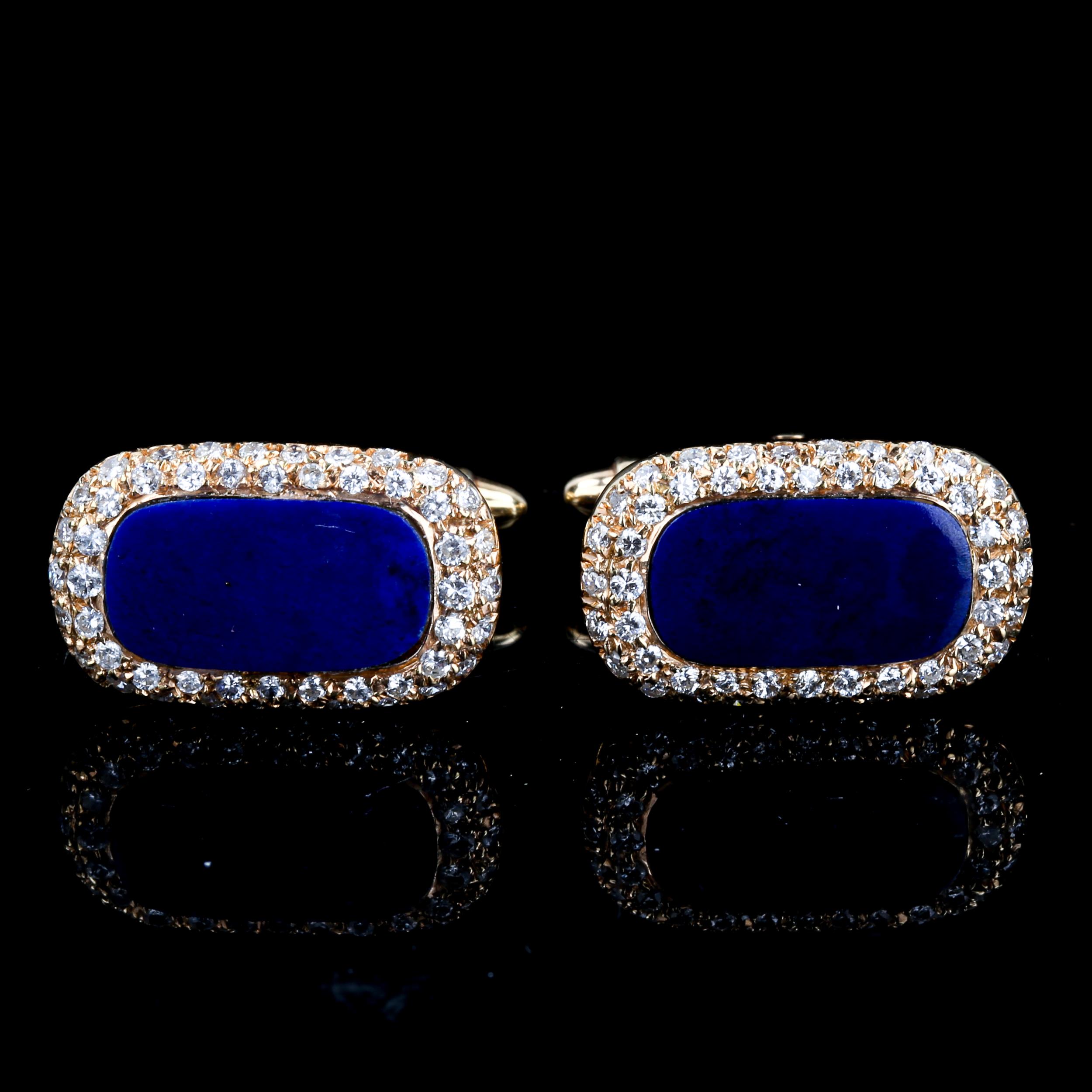 A pair of 18ct gold lapis lazuli and diamond cluster cufflinks, panel length 19.4mm, 11.7g Some glue