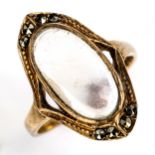 A Continental 9ct gold blue moonstone and marcasite dress ring, set with oval cabochon moonstone,