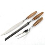 Style of JENS QUISTGAARD for Dansk, a 3-piece stainless steel roast carving set with teak handles,