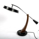 FASE, Spain, a 1950s' designed Presidente desk lamp, with swivel base and adjustable arm, moulded