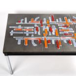 ADRI BELGIQUE, a 1960s tile-top coffee table with metal frame, signature in tile, length 93cm, width