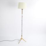 A mid-century Italian floor lamp, with Mondrian style enamel stem on polished brass tripod base,