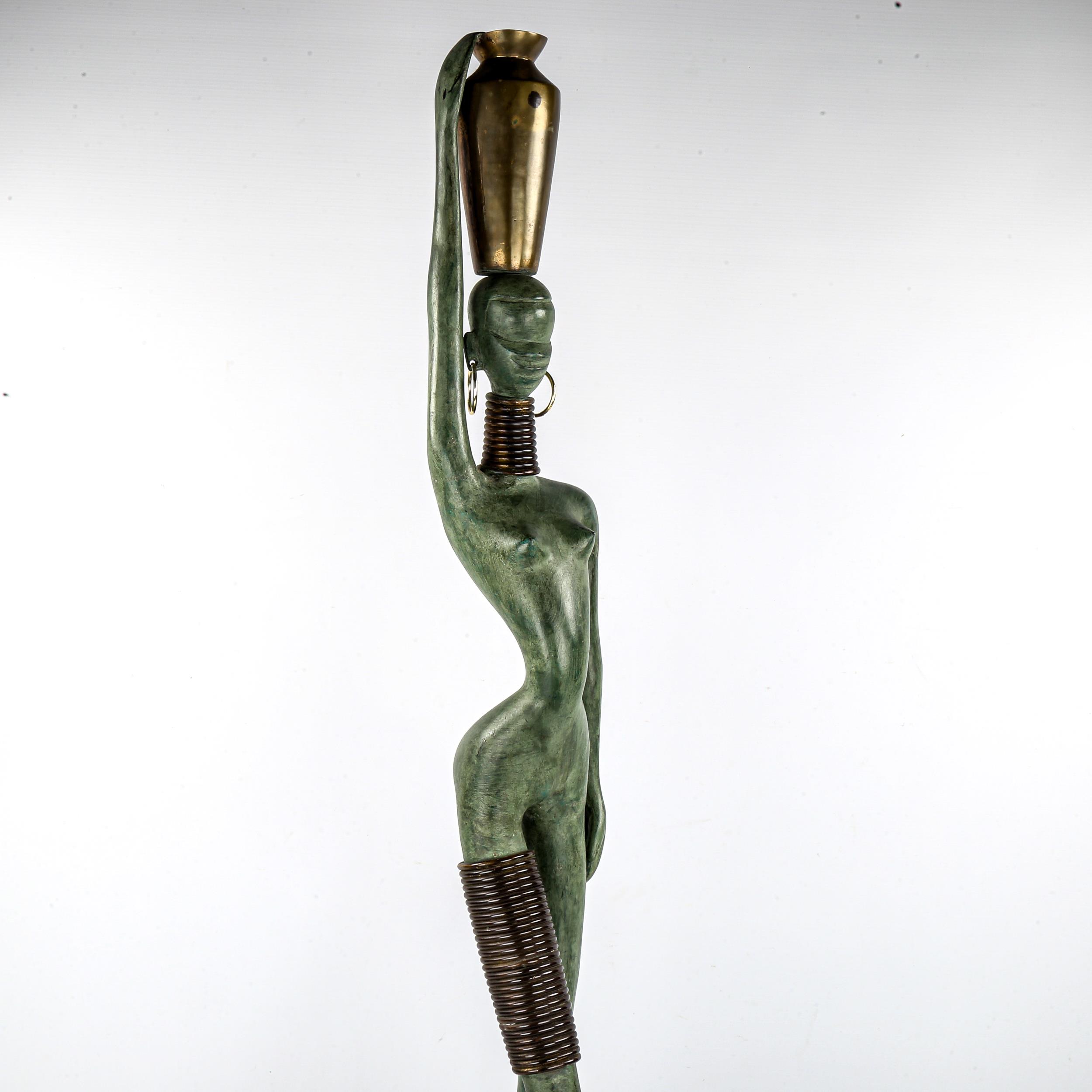 Manner of Hagenauer, a mid-century style patinated bronze or brass female water carrier, height 96cm - Image 3 of 4