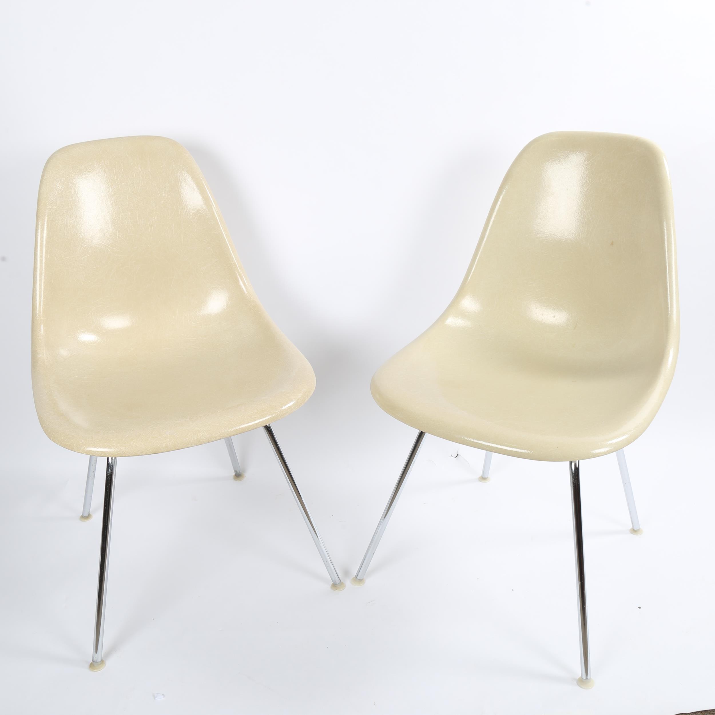 CHARLES EAMES for Herman Miller, a pair of 1970s model DSS fibreglass side chairs, stamped 19