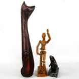 A tall mid-century cat sculpture in wood, signed to base Gerd Canada, an artist's lay figure, and