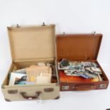 A quantity of Vintage family photographs, newspaper cuttings, postcards etc (2 cases)