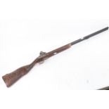 A reproduction double-barrelled flintlock sporting gun, barrel length 74cm