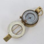 A Second World War Period mark III prismatic marching compass, by T G Co Ltd of London, with British