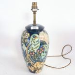 A Moorcroft blue ground Golden Lily pattern lamp, bell mark for 1991, height excluding fitting 32cm