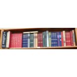 A shelf of folio edition books, including poetry, The Twelve Caesars, Rudyard Kipling etc