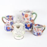 A large Victorian Ironstone jug, height 24cm, a smaller Mason's Ironstone jug, a similar mug, and