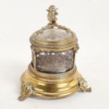 An unusual 19th century circular brass-framed cabinet box, cylindrical glass liner with pierced