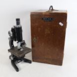 A Service II student's microscope, by Watson of London, height 34cm, in wooden carrying case, with
