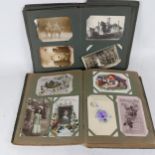 2 x albums containing early 20th century postcards, military cards, football and First War silk
