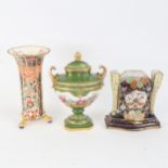 A Copeland Spode fluted vase, a Continental porcelain hand painted and gilded pedestal urn, and a